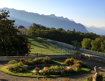 View of the vineyards and pavilion at the Château d'Hauteville in Switzerland. 