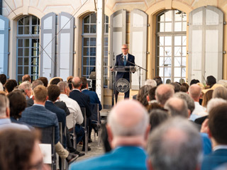 Crowd listening to speech