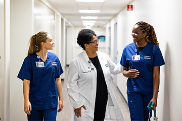Dean Angel Coaston with nursing students