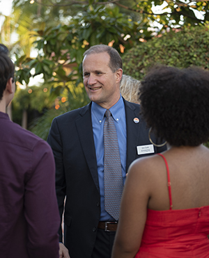 President Jim Gash greets students