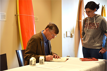 Larson signing Starkey's copy