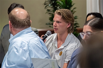 Philip Husband speaking at a policy event