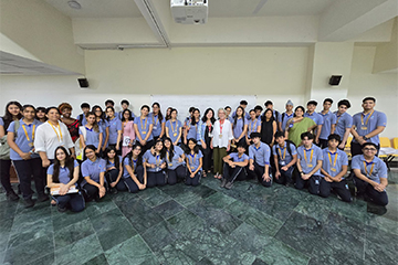 Stacey Lee Gobir and Horton (middle) posing with students