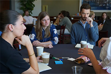 SCL alumni separated into roundtable discussions throughout the morning