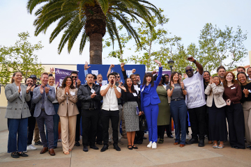 Members celebrate the completion of their Shark Tank casting pitches