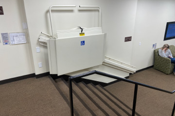 Wheelchair lift to help those who need assistance with the stairs.