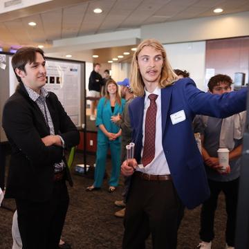 A student presenting research