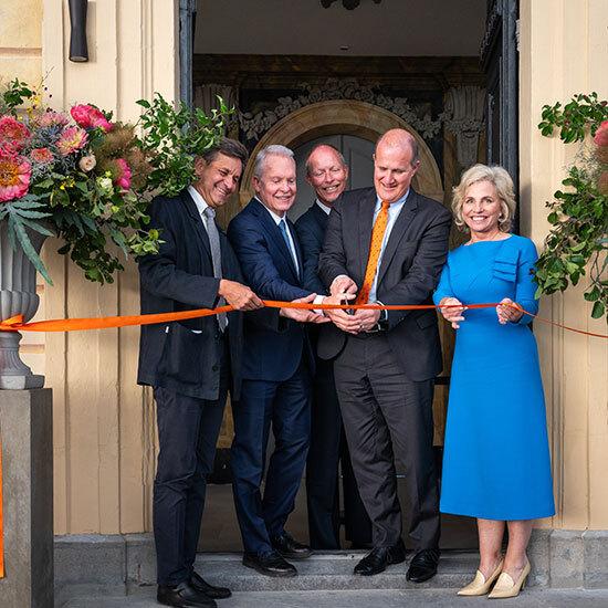 University officials cutting a ribbon