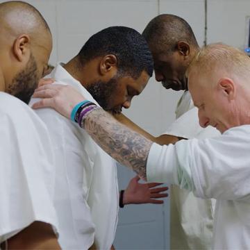 Inmates praying inside the Parchman Prison