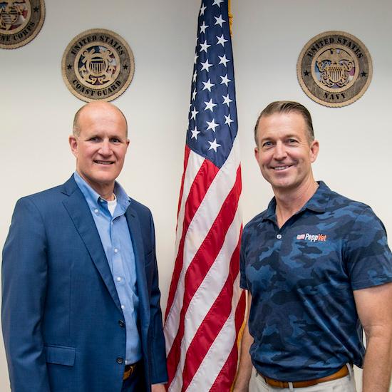 President Jim Gash and director of student veteran affairs Eric Leshinsky
