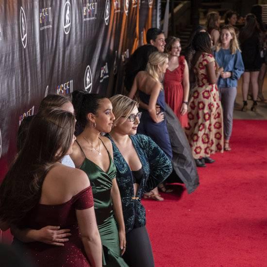 Students on the red carpet at the ReelStories Film Festival