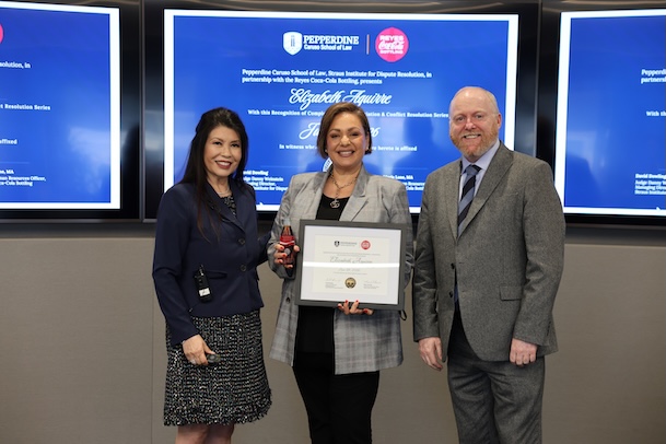 Smiling Graduate with Professor & Colleague