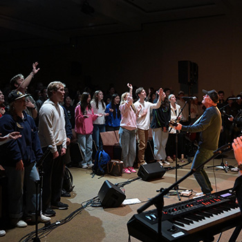 Tomling Worshipping with Students