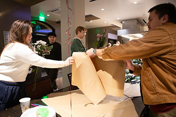 students gift wrapping