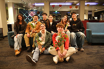 students with flowers
