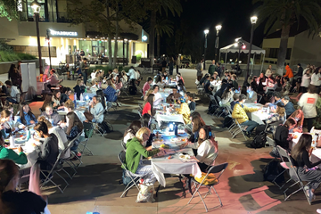 Students playing bingo outside