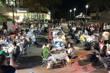 Students playing trivia outside