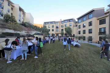 Students gathering outside the Seaside Residence Hall