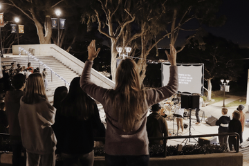 Students worshiping at the amphitheater