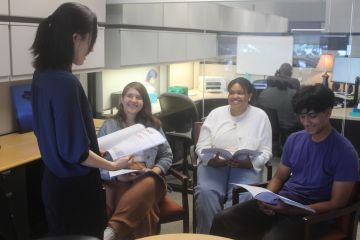 Students participating in a group coaching session
