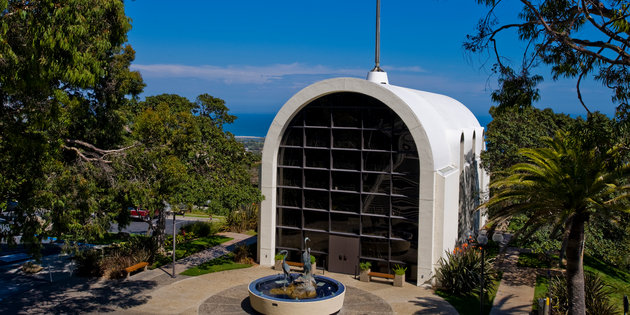 The front entrance of Stauffer Chapel with the water fountain - Pepperdine University