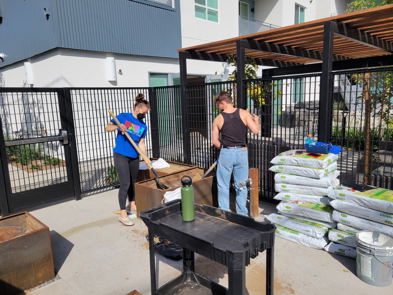 Two volunteers serving