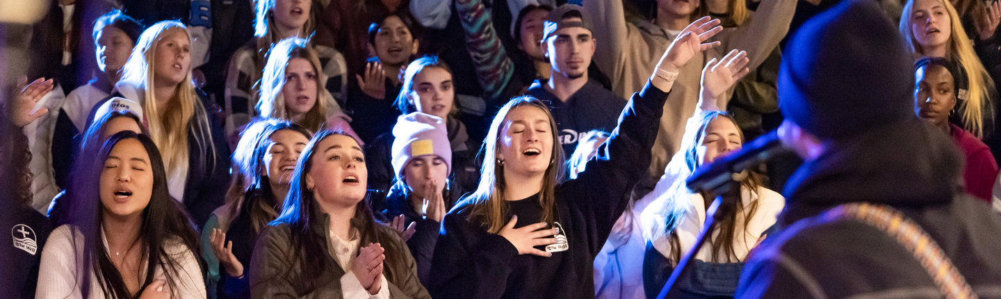 Image of students worshipping together during The Well