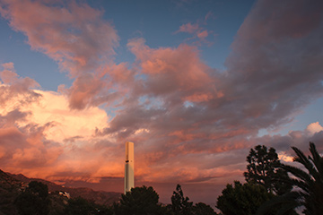 View of the theme tower at sunset with clouds