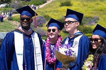 Pepperdine student veteran graduates with caps and gowns
