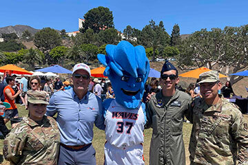 student veterans group posing with Willie the Wave