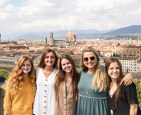students on the rooftop overlooking Florence